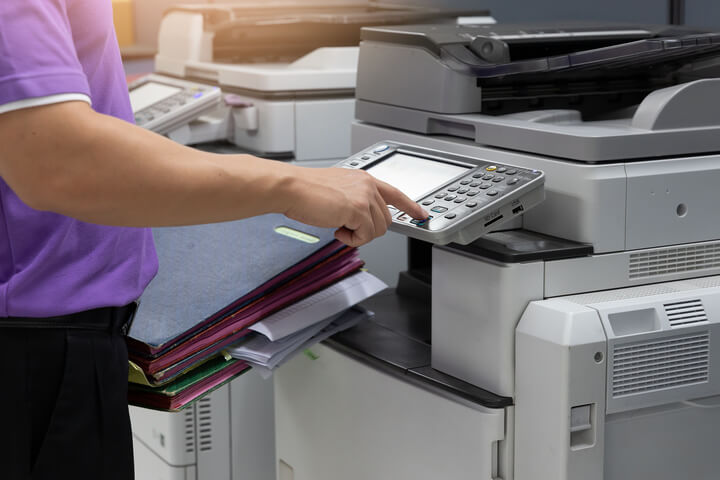 Businessman Using Printer